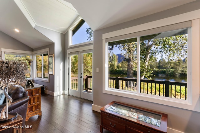 sunroom / solarium featuring french doors