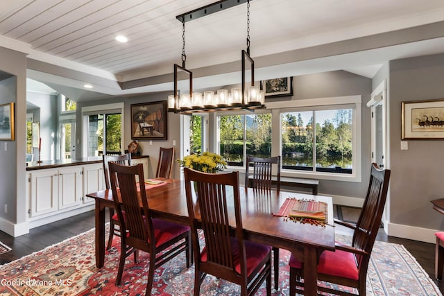 dining area with dark wood-style flooring, baseboards, recessed lighting, and vaulted ceiling