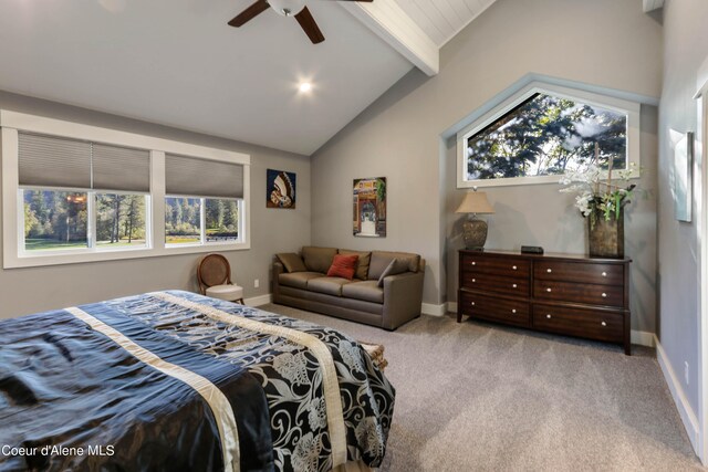 bedroom featuring ceiling fan, light colored carpet, and lofted ceiling with beams