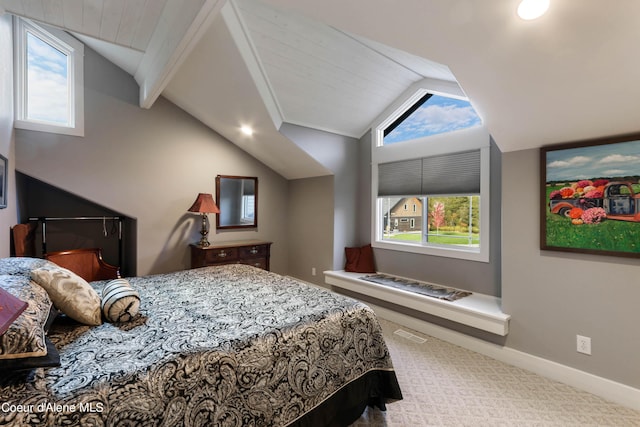 carpeted bedroom with multiple windows, baseboards, vaulted ceiling with beams, and visible vents
