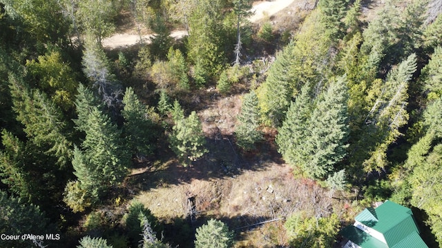 aerial view featuring a view of trees