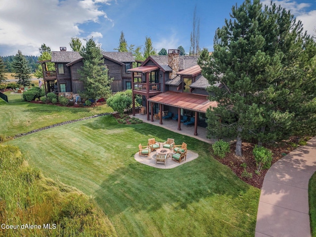 17021 S Citrine Dr, Coeur Dalene, ID 83814 - view of yard with a fire pit, a patio area, and a deck