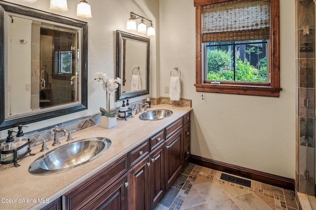 17021 S Citrine Dr, Coeur Dalene, ID 83814 - full bath with double vanity, a shower stall, visible vents, and a sink