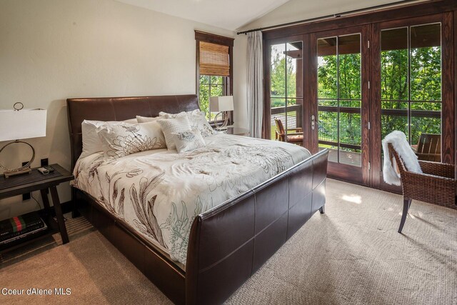 17021 S Citrine Dr, Coeur Dalene, ID 83814 - bedroom with vaulted ceiling, carpet floors, and access to exterior