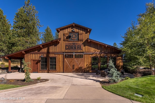 17021 S Citrine Dr, Coeur Dalene, ID 83814 - exterior space featuring a detached garage and concrete driveway