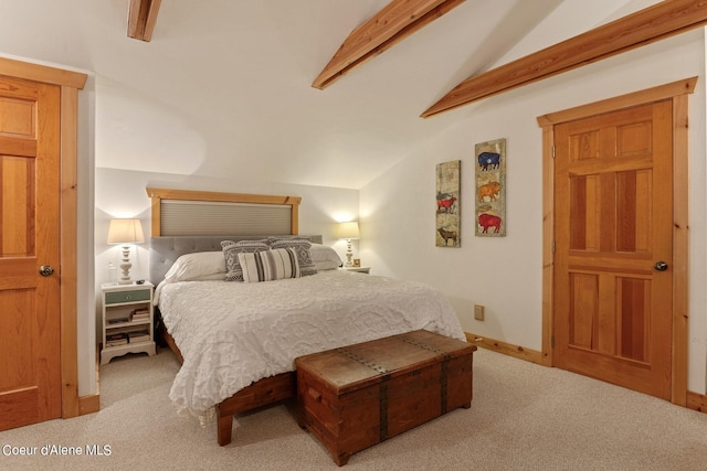 carpeted bedroom featuring vaulted ceiling with beams