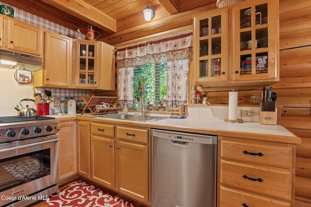 kitchen with wood walls, beamed ceiling, tasteful backsplash, ventilation hood, and appliances with stainless steel finishes