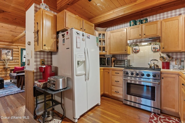 kitchen with white fridge with ice dispenser, light hardwood / wood-style flooring, high end stainless steel range oven, and beam ceiling