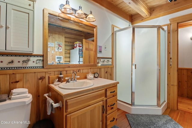 bathroom featuring walk in shower, vanity, hardwood / wood-style flooring, wooden ceiling, and beam ceiling