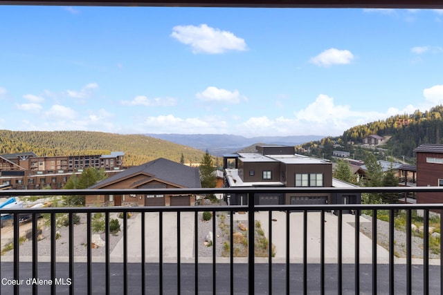 balcony with a mountain view and a residential view