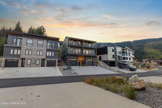 outdoor building at dusk with a garage