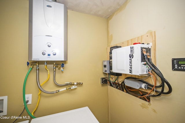 utility room with water heater