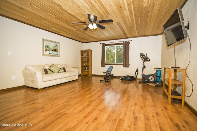 exercise area featuring ceiling fan, wooden ceiling, baseboards, and light wood-style floors