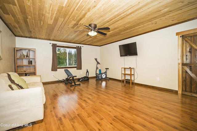 living area with wooden ceiling, baseboards, a ceiling fan, and wood finished floors