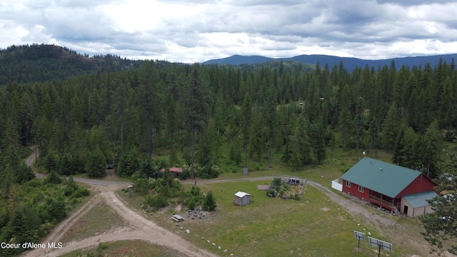 950 Old Range Rd, Clark Fork, ID 83811 - aerial view of property and surrounding area with a heavily wooded area and mountains