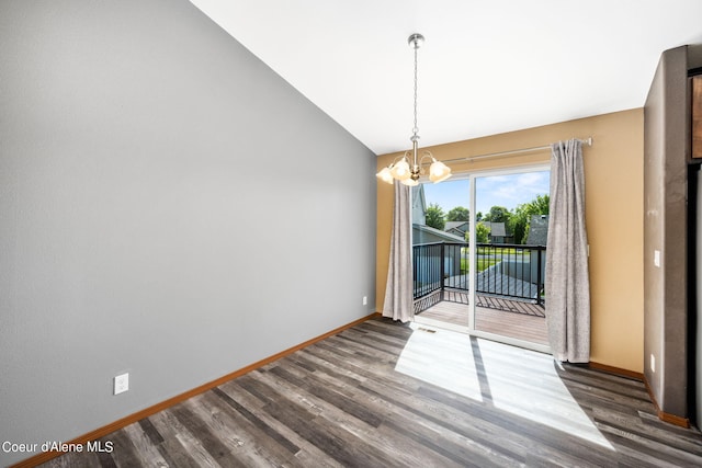 unfurnished dining area featuring an inviting chandelier, baseboards, lofted ceiling, visible vents, and dark wood-style floors