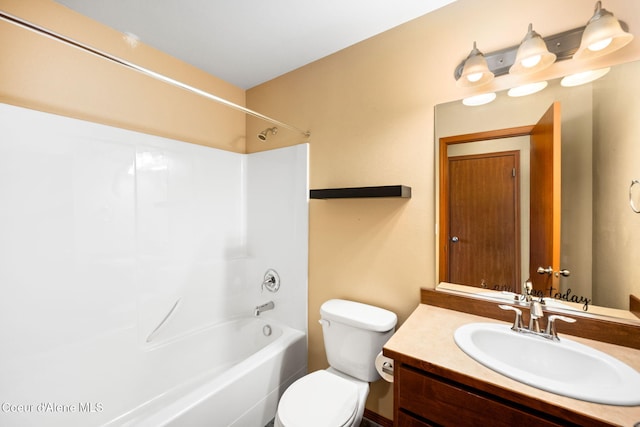 full bathroom featuring  shower combination, vanity, and toilet