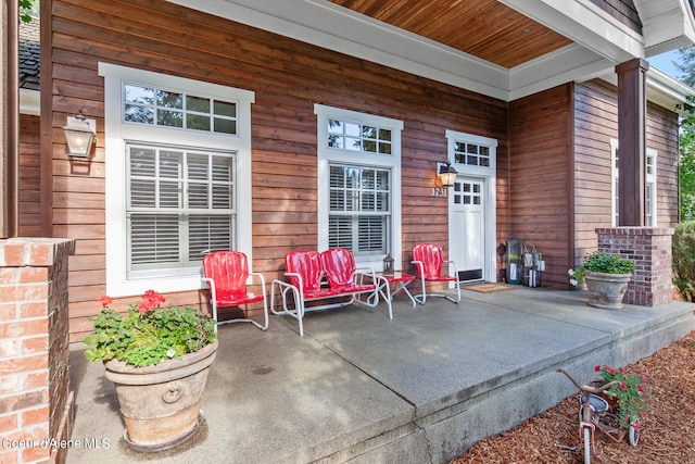 entrance to property with a patio area