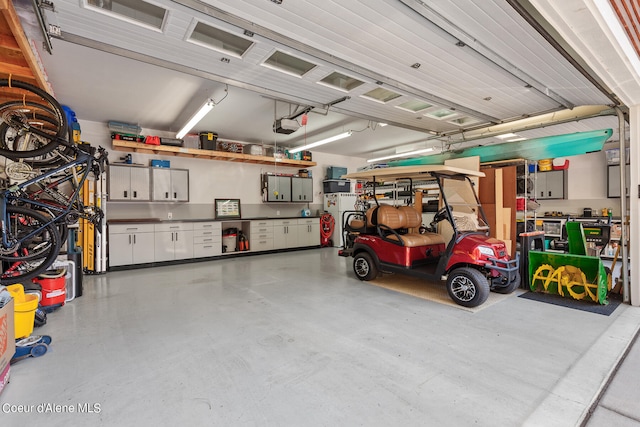 garage featuring a garage door opener