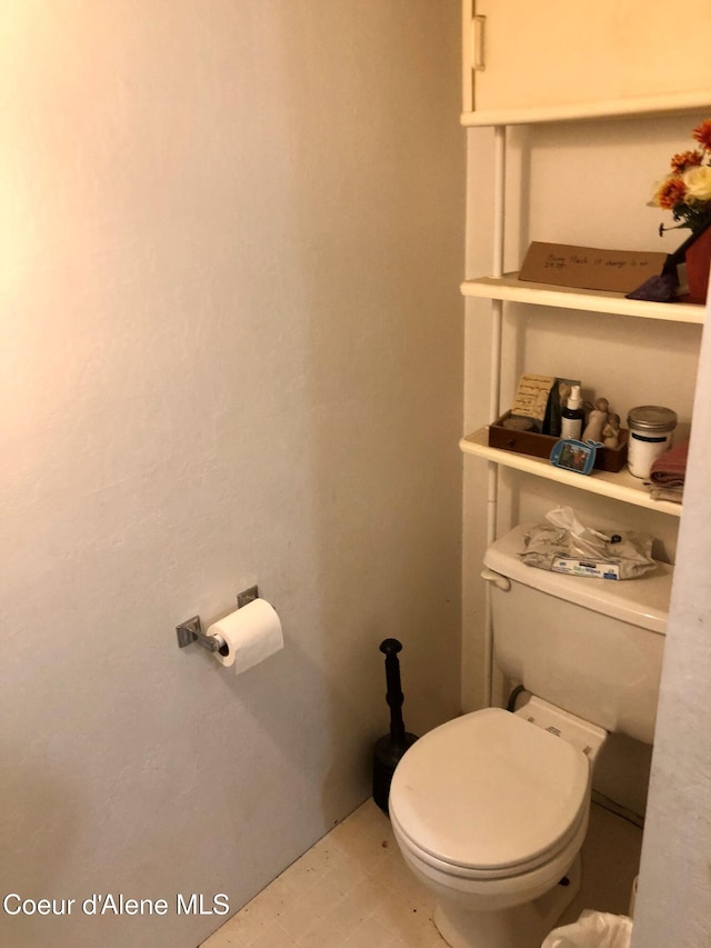 bathroom featuring toilet