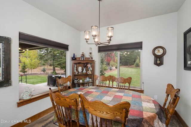 dining room featuring a notable chandelier and plenty of natural light