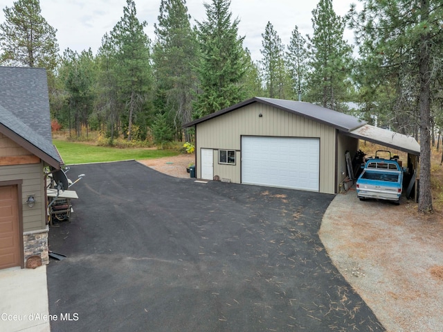 garage featuring a carport