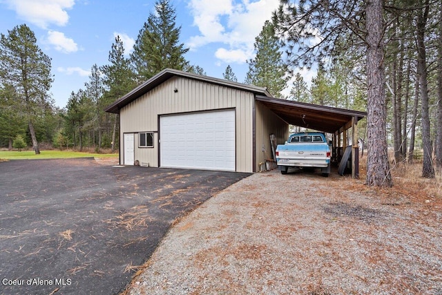 garage featuring a carport