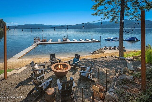 15374 S Chalone Dr, Coeur Dalene, ID 83814 - view of dock featuring a water and mountain view and a fire pit