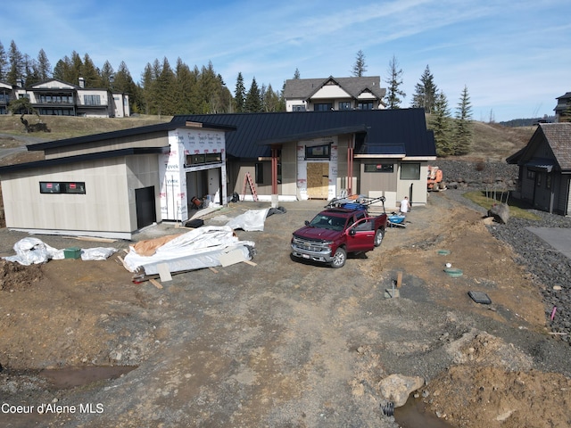 15374 S Chalone Dr, Coeur Dalene, ID 83814 - view of front of house with a standing seam roof and metal roof