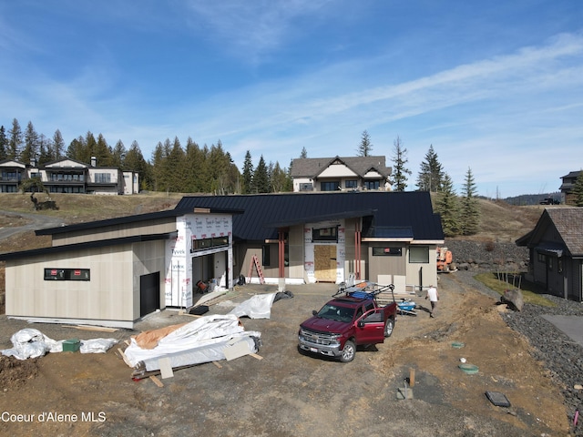 15374 S Chalone Dr, Coeur Dalene, ID 83814 - view of front facade with a standing seam roof and metal roof