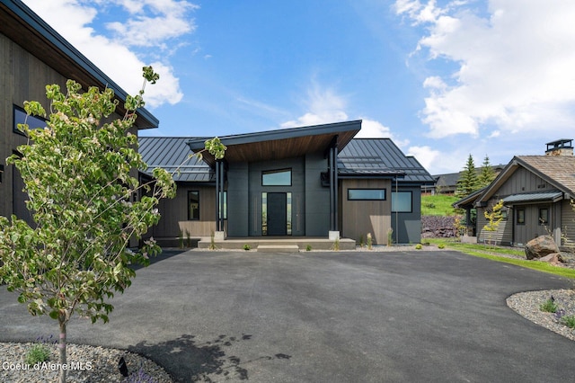 15374 S Chalone Dr, Coeur Dalene, ID 83814 - view of front of home with a standing seam roof and a metal roof