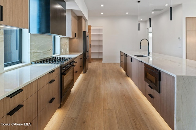 15374 S Chalone Dr, Coeur Dalene, ID 83814 - kitchen with premium appliances, modern cabinets, ventilation hood, light wood-type flooring, and recessed lighting