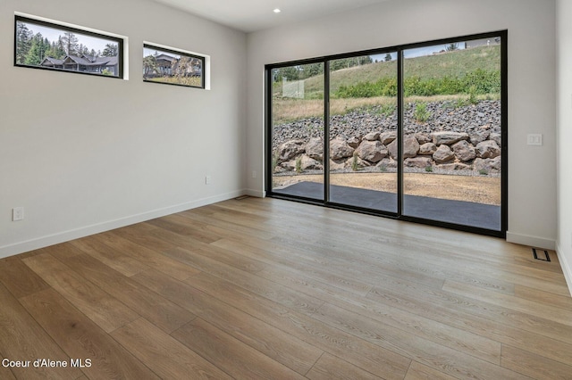 15374 S Chalone Dr, Coeur Dalene, ID 83814 - spare room featuring light wood-style flooring and recessed lighting
