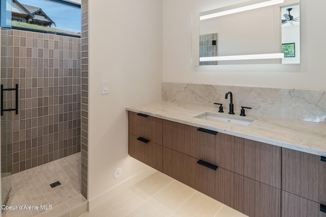 15374 S Chalone Dr, Coeur Dalene, ID 83814 - full bath with vanity, a shower stall, ceiling fan, and tile patterned floors