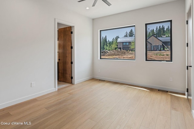 15374 S Chalone Dr, Coeur Dalene, ID 83814 - spare room with a ceiling fan, light wood-style floors, and recessed lighting
