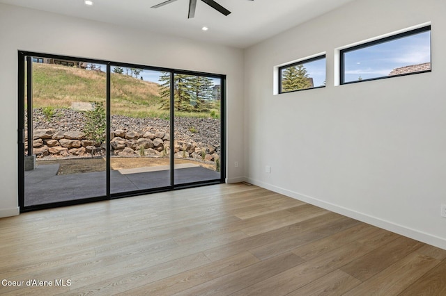 15374 S Chalone Dr, Coeur Dalene, ID 83814 - empty room featuring a ceiling fan, light wood-style floors, and recessed lighting