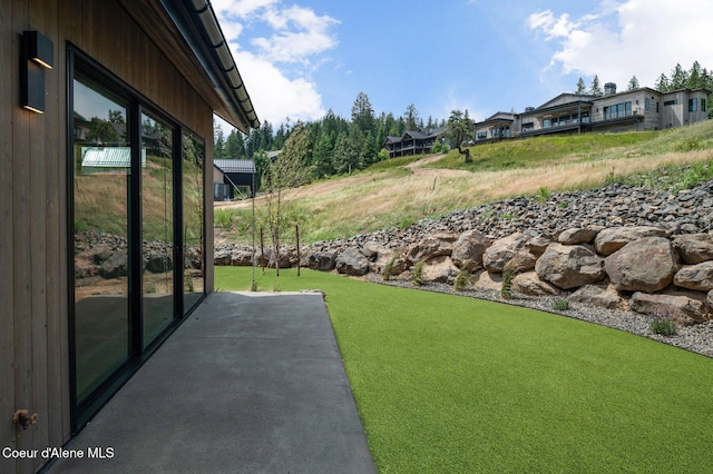 15374 S Chalone Dr, Coeur Dalene, ID 83814 - view of yard featuring a patio