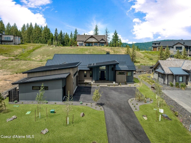 15374 S Chalone Dr, Coeur Dalene, ID 83814 - view of front facade featuring a standing seam roof and a metal roof