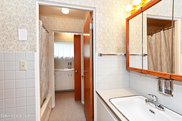 bathroom featuring shower / bathtub combination with curtain and vanity