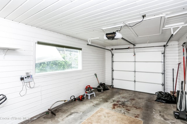 garage featuring a garage door opener