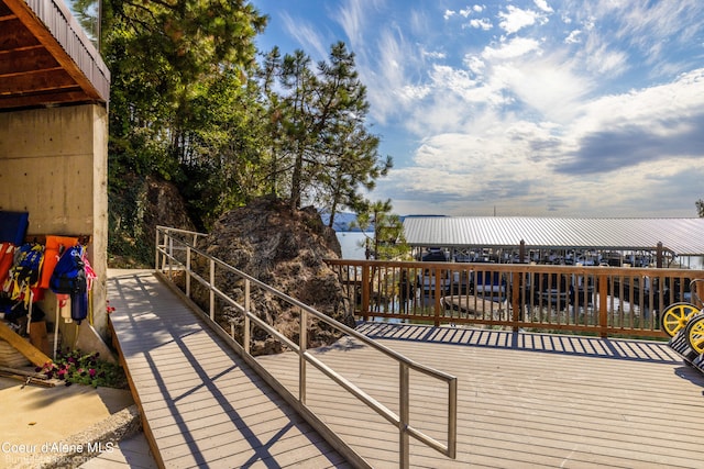 wooden deck with a water view