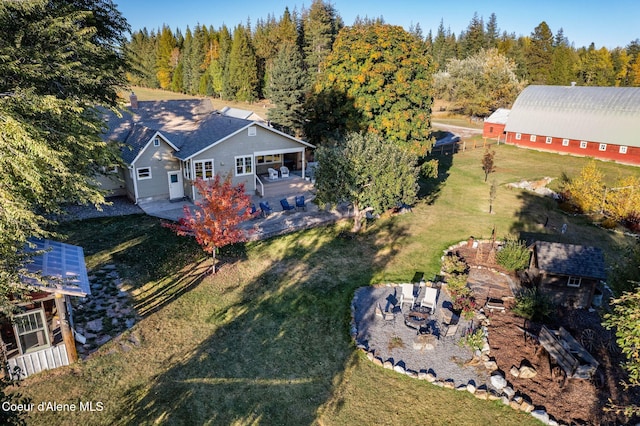 aerial view featuring a view of trees