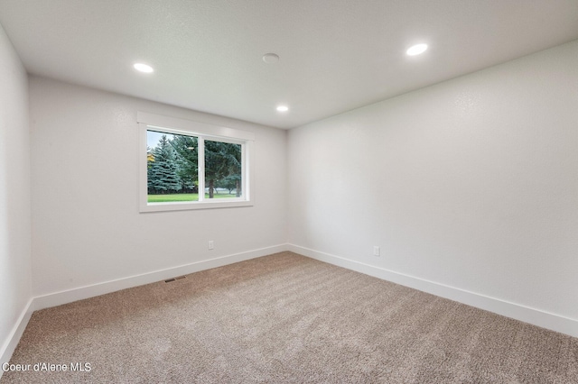 view of carpeted spare room