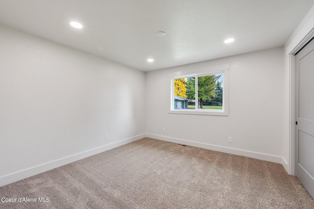 unfurnished bedroom featuring a closet and carpet flooring