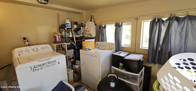 laundry room featuring washing machine and clothes dryer