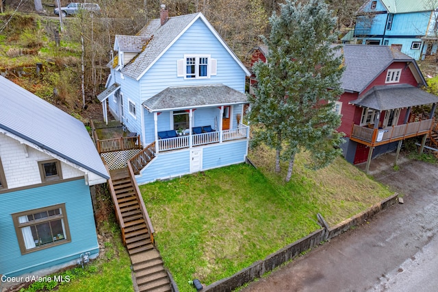 exterior space featuring a front yard and a deck