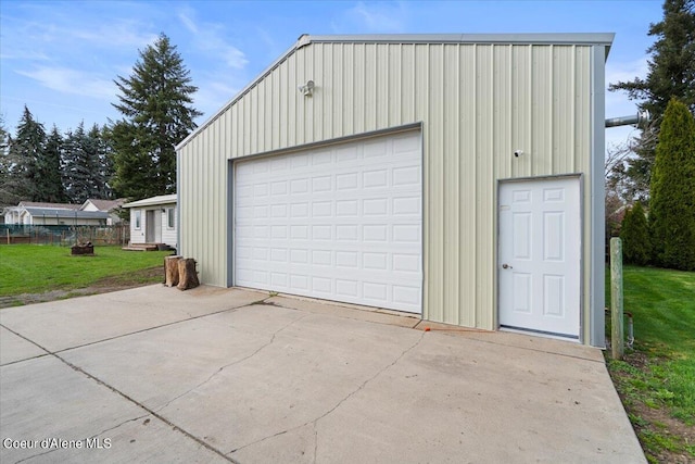 garage with a lawn