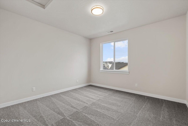 empty room featuring carpet