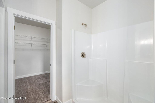 bathroom featuring walk in shower