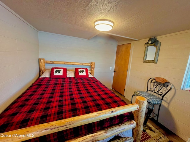 bedroom featuring a textured ceiling